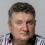 Олег Комаров